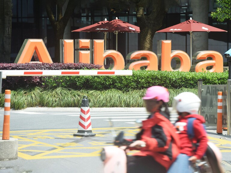 Alibaba stock up 60% from record low on improved earnings forecast