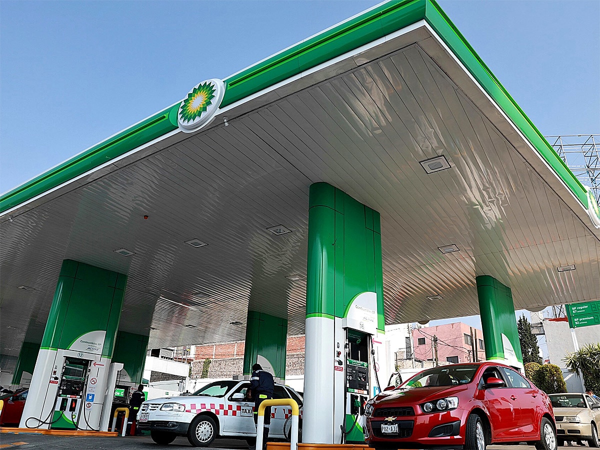 BP share price: Drivers fill up on petrol at a BP service station before hitting the gas