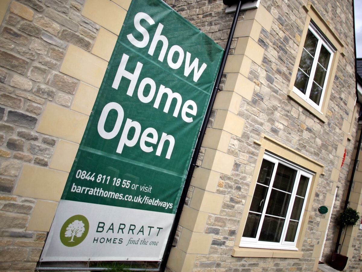 Show home poster from Barratt Developments on a new building