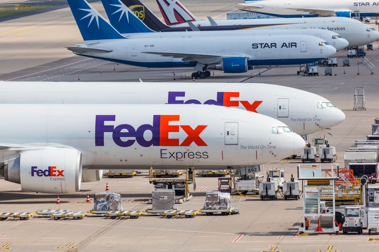 FedEx aircraft parked on the apron of an airport