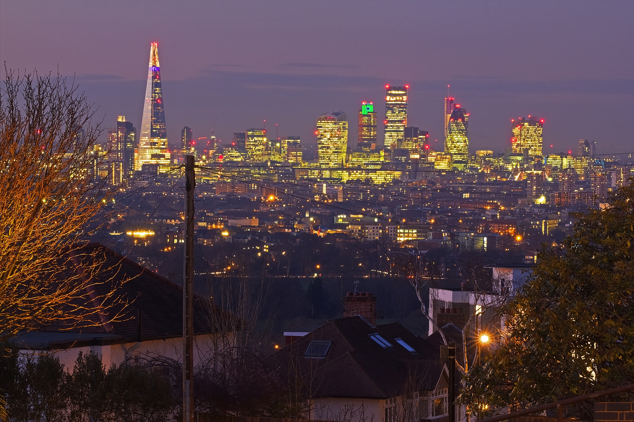 Annual review 2021: FTSE 100 - London skyline at night