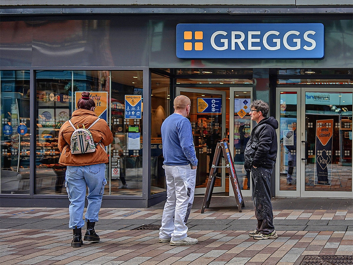 Shoppers outside a Greggs store
