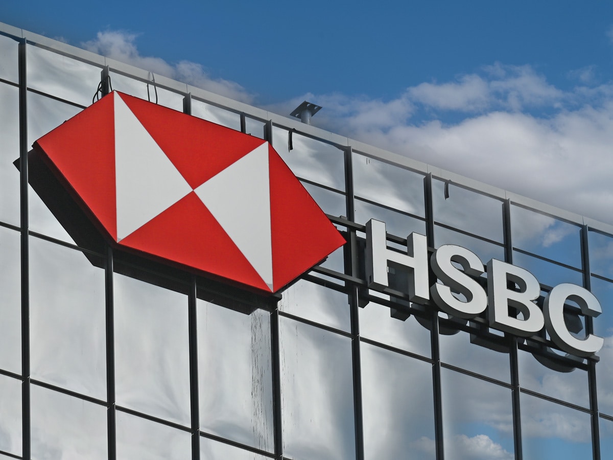 The HSBC symbol and name at the top of a glass office block