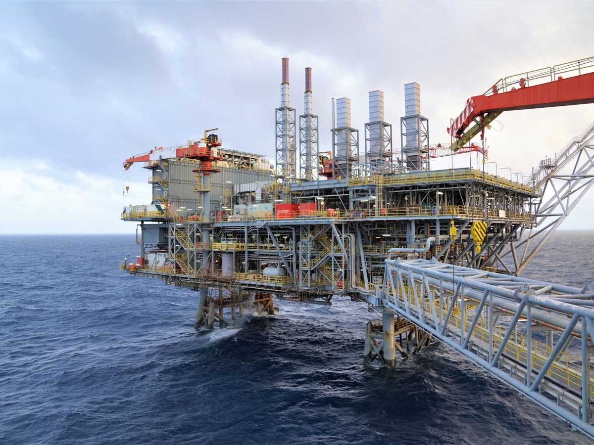 Harbour Energy share price: An oil and gas rig rises above the waves.