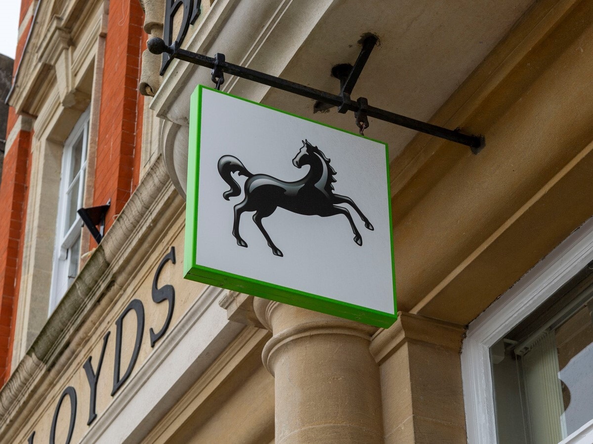 Lloyds share price: Lloyds' well-known black horse logo hangs outside one of the bank's branches.