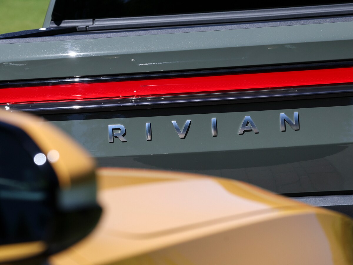 Up-close image of the Rivian logo on a car