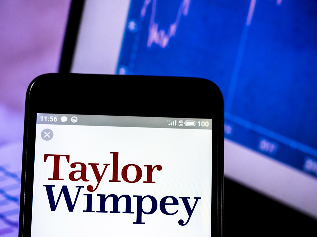 Taylor Wimpey share price: Taylor Wimpey logo on a mobile device