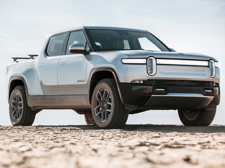 Will Tesla’s share price lose speed as Rivian’s electric trucks hit the ...