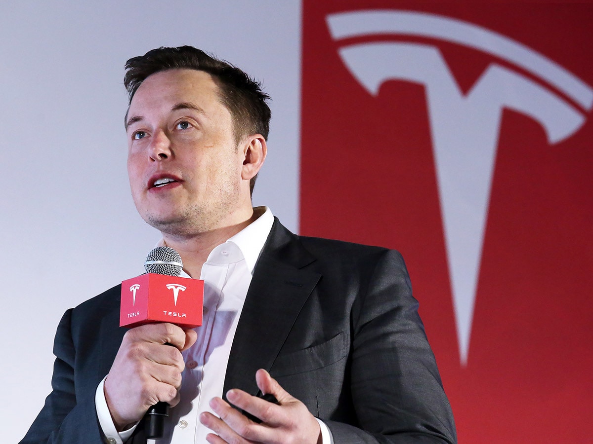 Tesla share price: Tesla's CEO Elon Musk addresses an audience.