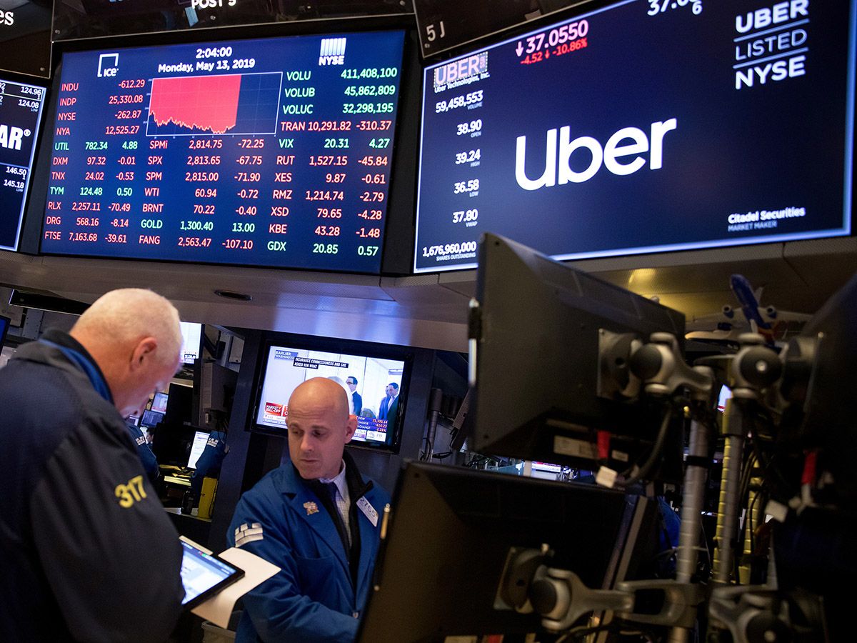 Stocks lower despite strong US jobs report, Uber accelerates