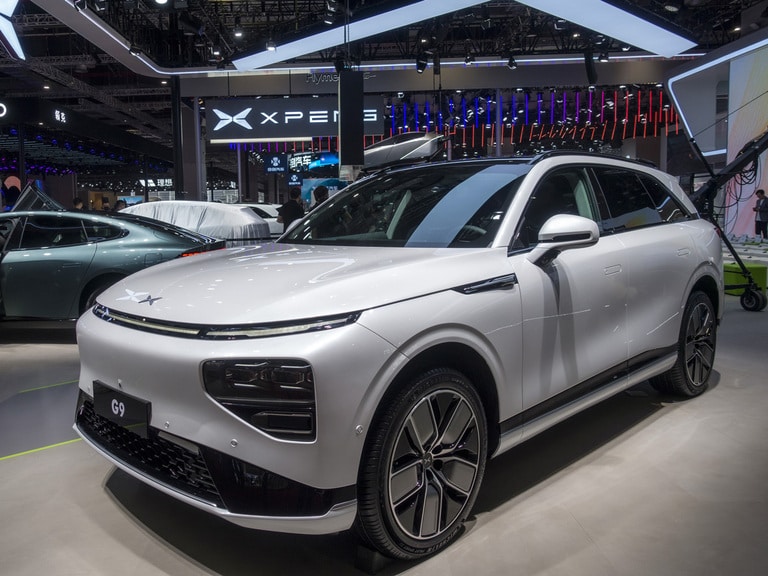 Xpeng’s Uncertain Outlook; Erdogan Courts Tesla; KKR Buys into SingTel.