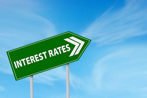 An upward green arrow suggesting higher interest rates are coming