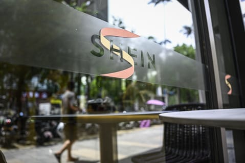 The Shein logo on an window outside the company's Guangzhou office.