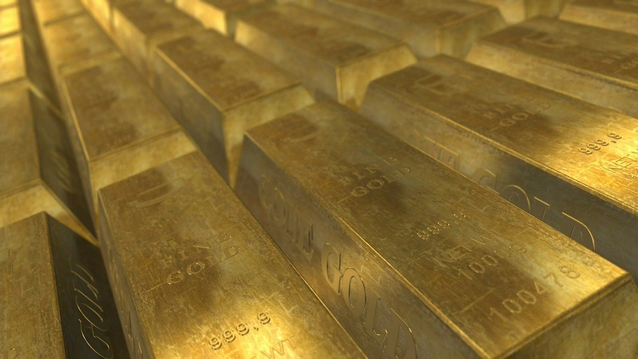 A photo of row after row of gold bars.