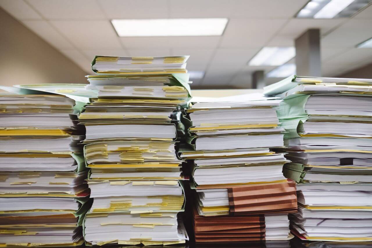 stack of documents on a table