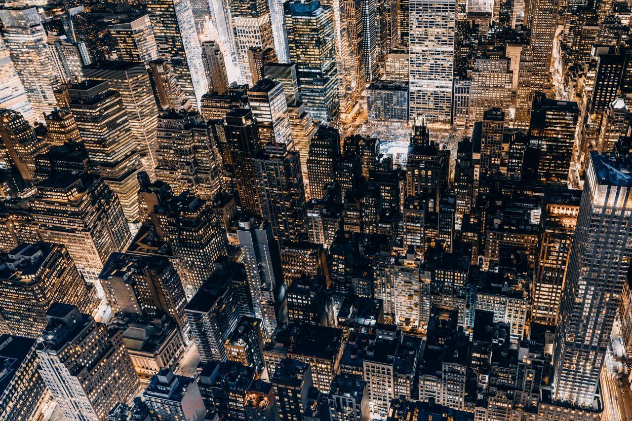 Aerial view of buildings in Manhattan at night / NYC