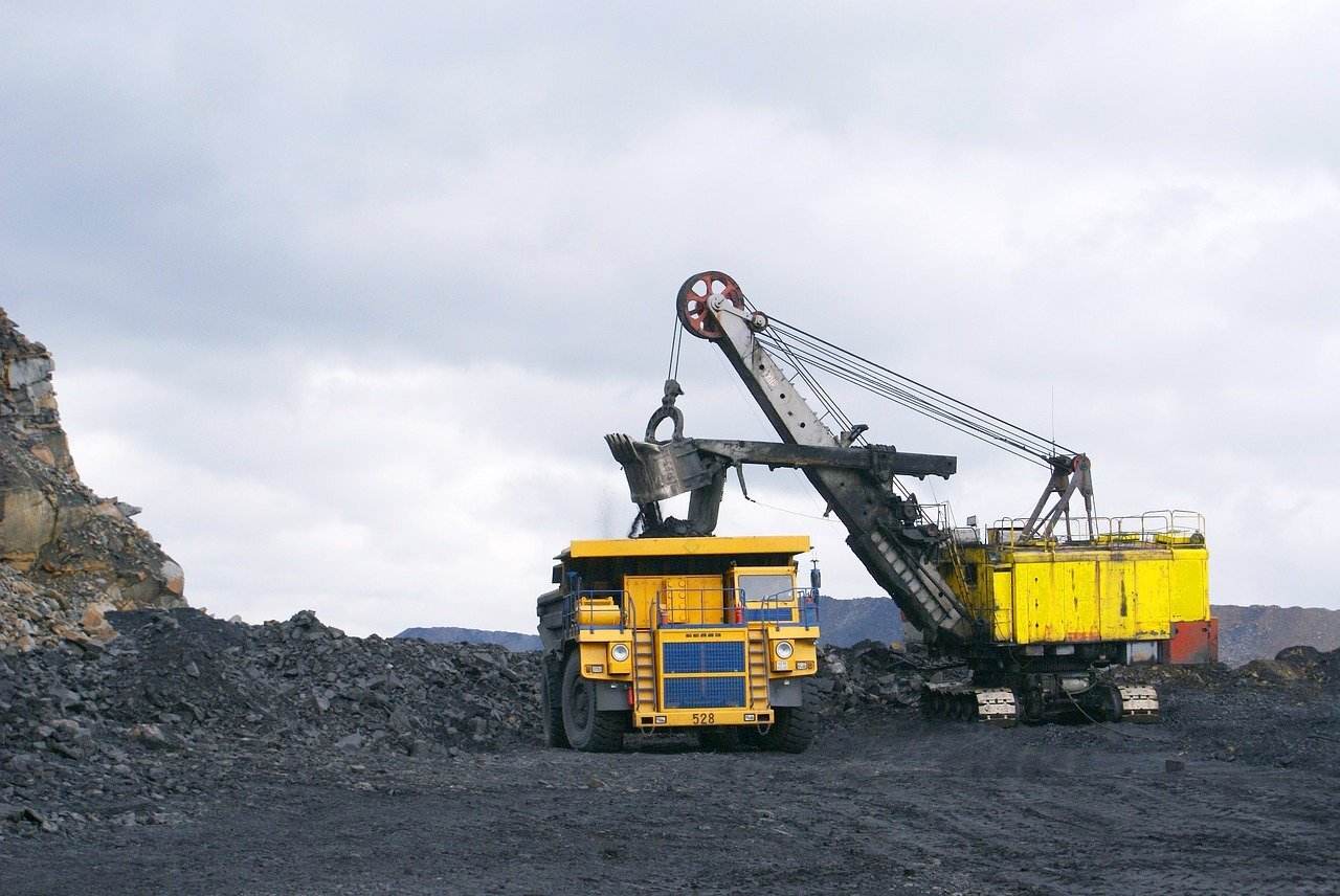 Coal being loaded into a dump truck at a mine